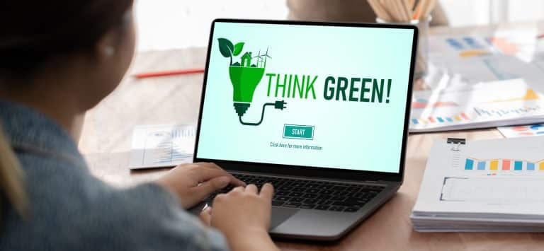 green websites, green hosting, sustainable websites, laptop with think green on it